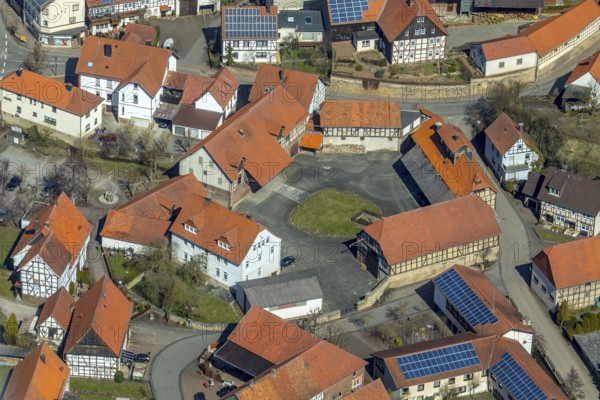 Aerial view, Adorf in Diemelsee in Hesse, town centre with courtyard domain, Romanesque basilica St. Johannis, dedicated to John the Baptist, fortified church. Diemelsee, district Waldeck-Frankenberg, North Hesse, Upland, Hesse, Germany, Diemelsee, DEU, Europe, birds-eyes view, aerial view, aerial photography, aerial photography, overview, overview, bird's eye view