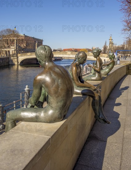 Bronze sculptures at river Spree in Berlin, the capital and largest city in Germany