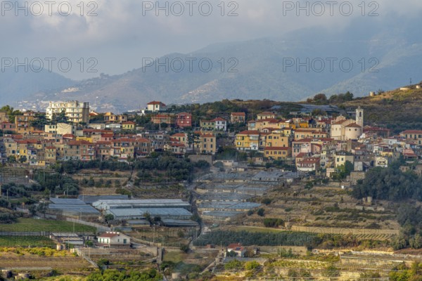 High angle view showing settlement around Bussana Vecchia, a former ghost town of the Liguria region in Italy