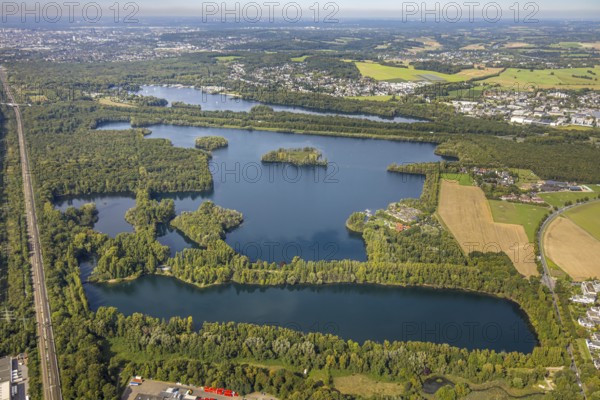 Aerial view, Elbsee, Unterbacher See and Menzelsee, railway line, Unterbach, Düsseldorf, Ruhr area, North Rhine-Westphalia, Germany, railway tracks, DE, Europe, green trees, landscape, landscape forms, aerial view, aerial photography, aerial photography, lake, overview, bird's eye view, birds-eyes view, green lung, overview