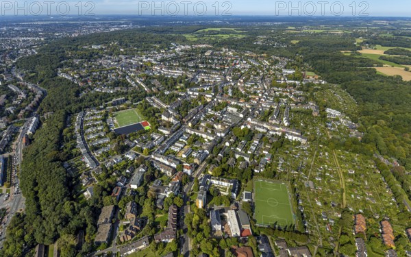 Aerial view, residential area district Gerresheim, sports field football stadium DJK Sportfreunde Gerresheim 1923 e.V. football department, below sports field football stadium TuS Gerresheim und Glashütte e.V., KGV Hambach'sche Wiese, Gerresheim, Düsseldorf, Ruhr area, North Rhine-Westphalia, Germany, DE, Europe, football, football pitch, football stadium, community garden, property tax, real estate, KGV, allotment garden, allotment garden site, allotment garden association, allotment gardener association, allotment garden, aerial view, aerial photography, allotment garden, sports, sports facility, sports field, overview, bird's-eye view, residential area, housing and living, residential area, residential quality, residential neighbourhood, housing estate, residential area, birds-eyes view, overview