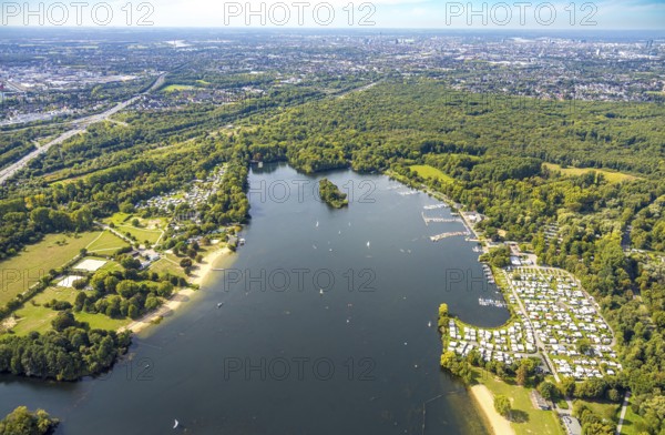 Aerial view, Unterbacher See with lido and campsite, Eller Forst, Unterbach, Düsseldorf, Ruhr area, North Rhine-Westphalia, Germany, motorway, railway tracks, DE, Europe, green trees, landscape, landscape forms, aerial view, aerial photography, aerial photography, lake, road traffic, overview, bird's eye view, birds-eyes view, green lung, overview