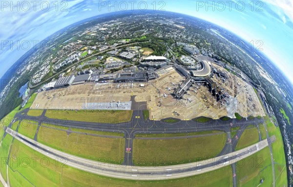 Aerial view, DUS Airport Düsseldorf with reception building and commercial area DUS Airport-City, earth globe, fisheye image, 360 degree image, tiny world, little planet, fisheye image, Unterrath, Düsseldorf, Ruhr area, North Rhine-Westphalia, Germany, terminal building, DE, reception building, Europe, fish-eye lens, fisheye lens, flight mission, airport, aircraft noise, airfield, aeroplane, runway, little planet, aerial photography, aerial photography, runway, super wide angle lens, tiny world, overview, bird's eye view, globe, birds-eyes view, fisheye lens, insta360 camera, overview