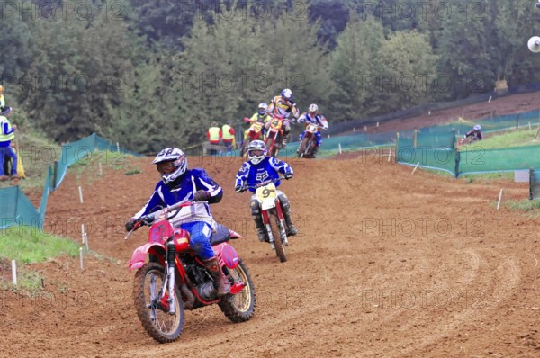 Motocross, Rudersberg, Baden-Württemberg, Germany, Europe, Motocross riders on track in the forest, Rudersberg motocross