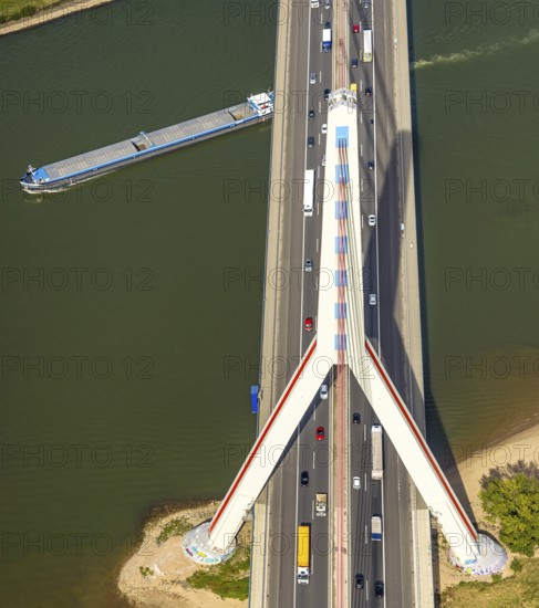 Aerial view, Fleher Bridge with bridge pylon over the river Rhine, inland navigation, motorway A46, Flehe, Düsseldorf, Ruhr area, North Rhine-Westphalia, Germany, motorway, bridge, DE, Europe, aerial view, aerial photography, aerial photography, ship, cable-stayed bridge, road traffic, overview, bird's-eye view, overview