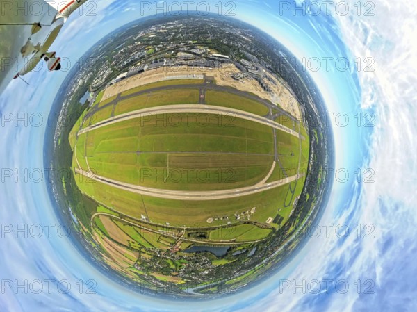 Aerial photo, DUS Airport Düsseldorf with runway and landing strip, globe, fisheye image, 360 degree image, tiny world, little planet, fisheye image, Lohausen, Düsseldorf, Ruhr area, North Rhine-Westphalia, Germany, terminal building, DE, reception building, Europe, fisheye lens, fisheye lens, flight mission, airport, aircraft noise, airfield, aeroplane, runway, little planet, aerial view, aerial photography, aerial photography, runway, super wide angle lens, tiny world, overview, bird's eye view, globe, birds-eyes view, fisheye lens, insta360 camera, overview