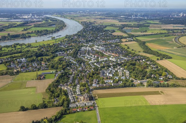 Aerial view, residential area district Wittlaer at the river Rhine, surrounded by meadows and fields, Wittlaer, Düsseldorf, Ruhr area, North Rhine-Westphalia, Germany, DE, Europe, property tax, real estate, aerial view, aerial photography, aerial photography, overview, bird's-eye view, residential complex, living and life, residential area, residential quality, residential neighbourhood, housing estate, residential district, birds-eyes view, overview