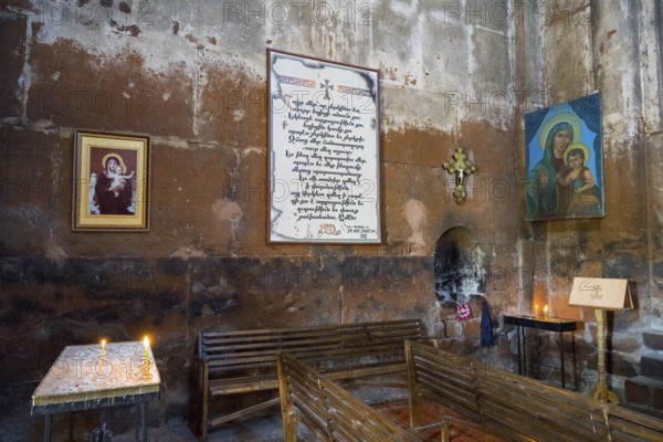 Church room with religious art, written work, candlelight, Marmashen Monastery, Marmashen Vank, Shirak Province, Armenia