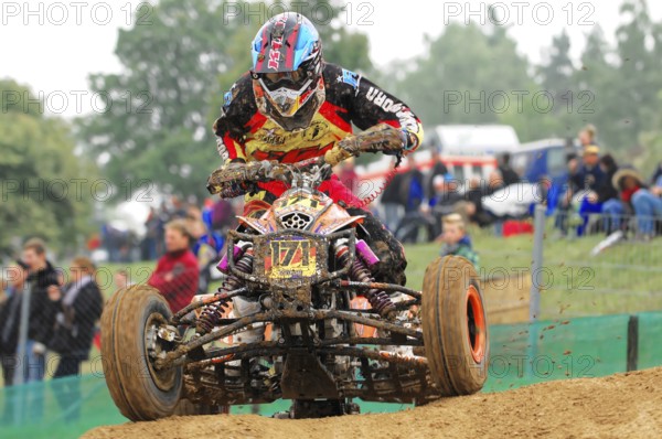 Motocross, Rudersberg, Baden-Württemberg, Germany, Europe, Close-up of a quad rider in a race, surrounded by spectators on an off-road track, Rudersberg motocross