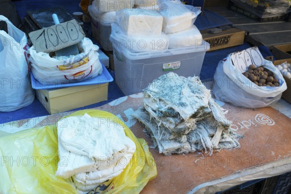 Various cheeses and walnuts for sale at a market stall, Gyumri, Gyumri, Shirak province, Armenia