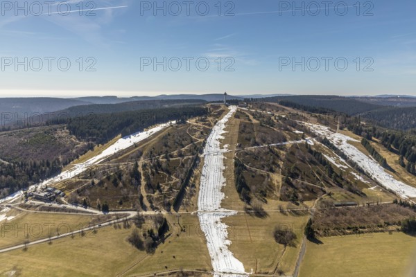 Aerial view, Ettelsberg with snow remains on the slopes in Willingen in Hesse. Willingen (Upland), district Waldeck-Frankenberg in Hesse, Hesse, Germany, Willingen (Upland), DEU, Europe, birds-eyes view, aerial view, aerial photography, aerial photography, overview, overview, bird's eye view