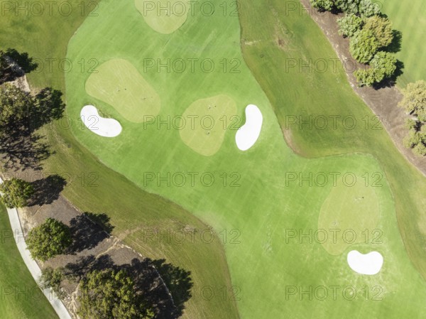 Driving range with greens and bunkers at the San Roque Club Golf Resort. Aerial view. Drone shot. Cádiz province, Andalusia, Spain