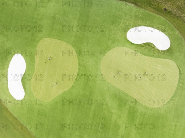 Driving range with greens and bunkers at the San Roque Club Golf Resort. Aerial view. Drone shot. Cádiz province, Andalusia, Spain