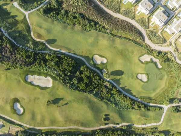 Partial view of the La Hacienda Links Golf Resort and the Fairmont La Hacienda hotel. Aerial view. Drone shot. Cádiz province, Andalusia, Spain