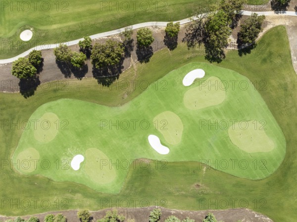Driving range with greens and bunkers at the San Roque Club Golf Resort. Aerial view. Drone shot. Cádiz province, Andalusia, Spain