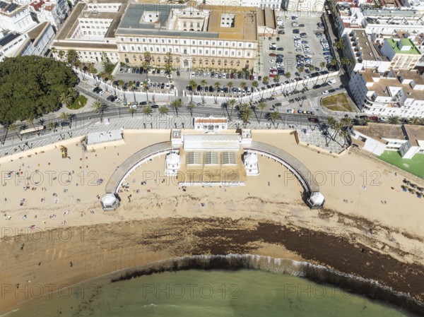 The old quarter of the town of Cádiz. Prominent the Caleta beach and the old Balneario de la Palma. Aerial view. Drone shot. Cádiz province, Andalusia, Spain