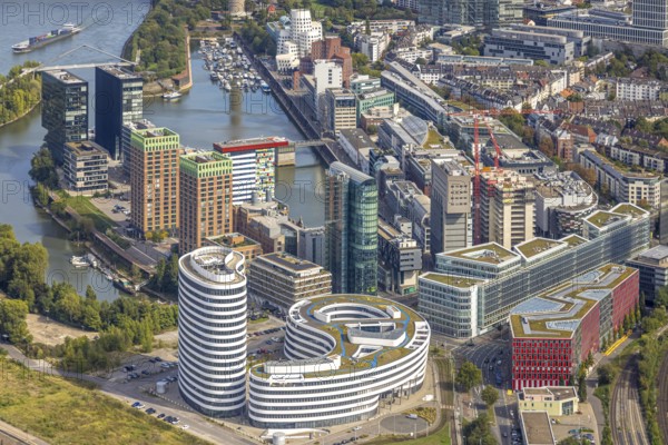 Aerial view, Media harbour on the river Rhine, construction site with construction crane and new Uniq Towers between Kaistraße and Zollhof, harbour, Düsseldorf, Ruhr area, North Rhine-Westphalia, Germany, construction work, construction area, construction site, building plots, construction project, construction site, DE, Europe, commercial enterprise, commercial area, commercial area, commercial property, commercial site, commercial use, industrial area, industrial site, aerial photograph, aerial photography, aerial photography, media centre, new building, overview, bird's-eye view, birds-eyes view, overview