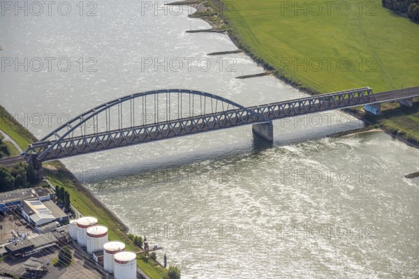 Aerial view, Hammer railway bridge over the river Rhine, harbour, Düsseldorf, Ruhr area, North Rhine-Westphalia, Germany, bridge, DE, Europe, river, aerial view, aerial photography, aerial photography, overview, bird's-eye view, birds-eyes view, overview
