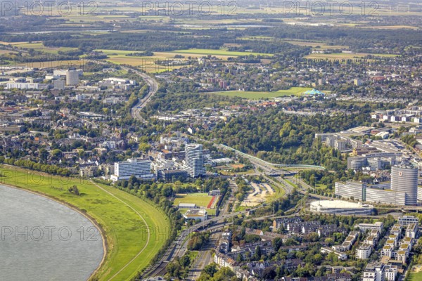 Aerial view, high-rise building The Zipper Hotel and Apartments, Schön Klinik Hospital, between the banks of the Rhine and the federal road B7, on the right the Vodafone high-rise office building with multi-storey car park, Heerdt, Düsseldorf, Ruhr area, North Rhine-Westphalia, Germany, DE, Europe, gastronomy, healthcare, hospital, hotel, hotel complex, hotel business, clinic, clinic, hospital, hospital, aerial view, aerial photography, aerial photography, medical facility, medical assistance, overview, bird's-eye view, birds-eyes view, overview, medical care