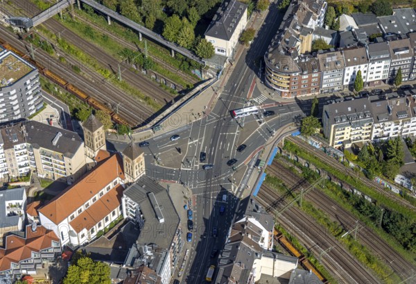 Aerial view, catholic church St. Elisabeth, bridge over railway tracks with road crossing Ackerstraße Vinzenzplatz, city centre, Düsseldorf, Ruhr area, North Rhine-Westphalia, Germany, place of worship, DE, Europe, religious community, place of worship, holy place, church, parish, denomination, crossing, aerial view, aerial photography, aerial photography, religion, religious site, road crossing, road traffic, overview, bird's eye view, birds-eyes view, overview