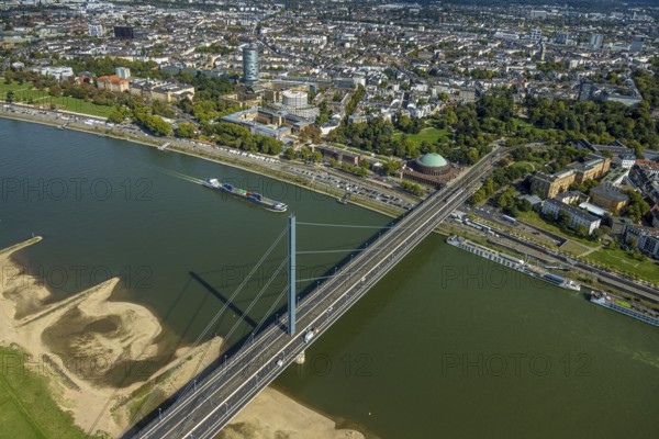 Aerial view, Oberkasseler Brücke over the river Rhine and Tonhalle Düsseldorf, Rhine promenade, North Rhine-Westphalia-Forum Düsseldorf and Kunstpalast Düsseldorf in the Ehrenhof, district government and round high-rise building ERGO Group AG, Pempelfort, Düsseldorf, Ruhr area, North Rhine-Westphalia, Germany, bridge, DE, Europe, events, river, culture, art, aerial view, aerial photography, aerial photography, theatre, overview, event hall, event venue, event centre, bird's eye view, birds-eyes view, cultural use, overview