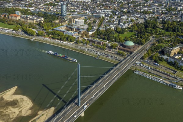 Aerial view, Oberkasseler Brücke over the river Rhine and Tonhalle Düsseldorf, Rhine promenade, North Rhine-Westphalia-Forum Düsseldorf and Kunstpalast Düsseldorf in the Ehrenhof, district government and round high-rise building ERGO Group AG, Pempelfort, Düsseldorf, Ruhr area, North Rhine-Westphalia, Germany, bridge, DE, Europe, events, river, culture, art, aerial view, aerial photography, aerial photography, theatre, overview, event hall, event venue, event centre, bird's eye view, birds-eyes view, cultural use, overview