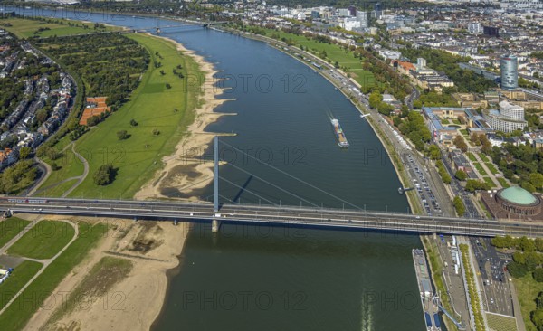 Aerial view, Oberkasseler Brücke over the river Rhine and Tonhalle Düsseldorf, Rhine promenade, North Rhine-Westphalia-Forum Düsseldorf and Kunstpalast Düsseldorf Ehrenhof, district government and round high-rise building ERGO Group AG, Pempelfort, Düsseldorf, Ruhr area, North Rhine-Westphalia, Germany, bridge, DE, Europe, events, river, culture, art, aerial view, aerial photography, aerial photography, theatre, overview, event hall, event venue, event centre, bird's-eye view, birds-eyes view, cultural use, overview