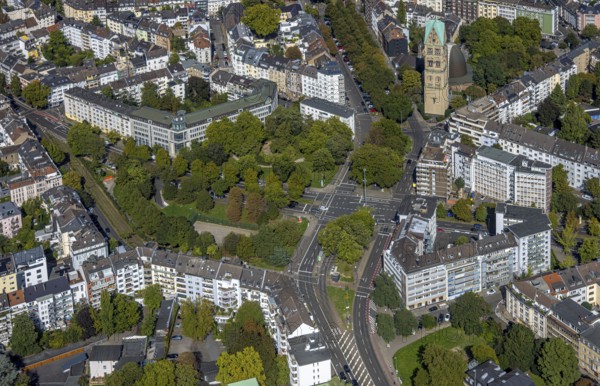 Aerial view, park and street crossing Prinz-Georg-Straße with Vagedesstraße, bus stop D-Schloss Jägerhof, catholic church St. Rochus, Pempelfort, Düsseldorf, Ruhr area, North Rhine-Westphalia, Germany, place of worship, DE, Europe, religious community, place of worship, holy place, church, parish, denomination, crossing area, aerial view, aerial photography, aerial photography, religion, religious site, road traffic, overview, bird's eye view, birds-eyes view, overview