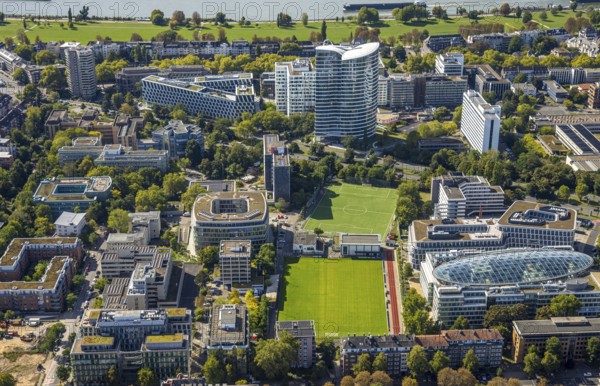 Aerial view, Sky Office high-rise office building, sports centre north football stadium BV 04 Düsseldorf e.V., Spherion office building by architect Jürgen Koch, Golzheim, Düsseldorf, Ruhr area, North Rhine-Westphalia, Germany, DE, Europe, football, football field, football stadium, commercial enterprise, commercial area, commercial property, commercial site, commercial use, aerial photograph, aerial photography, aerial photography, sports, sports facility, sports field, overview, bird's eye view, birds-eyes view, overview