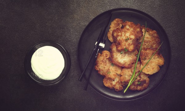 Potato pancakes, pancakes with sour cream, Belarusian dish, homemade, no people