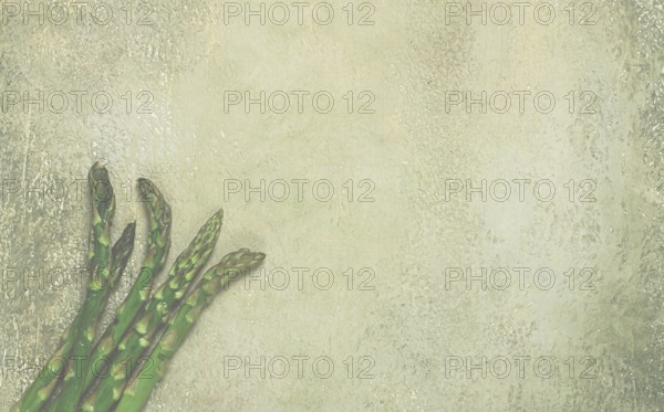 Fresh asparagus, on the table, food background, concept, rustic style, top view, no people