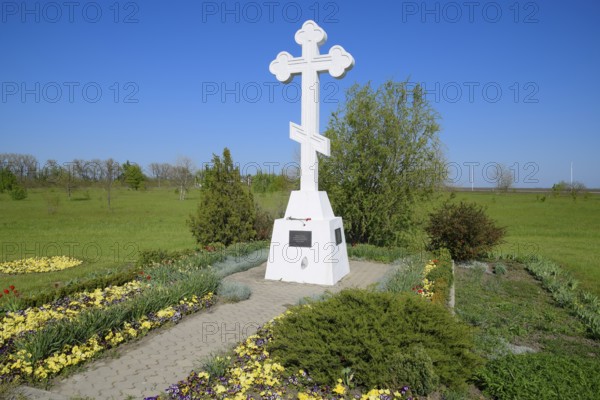 Orthodox cross on the entrance to the settlement. Krasnodar, Russia