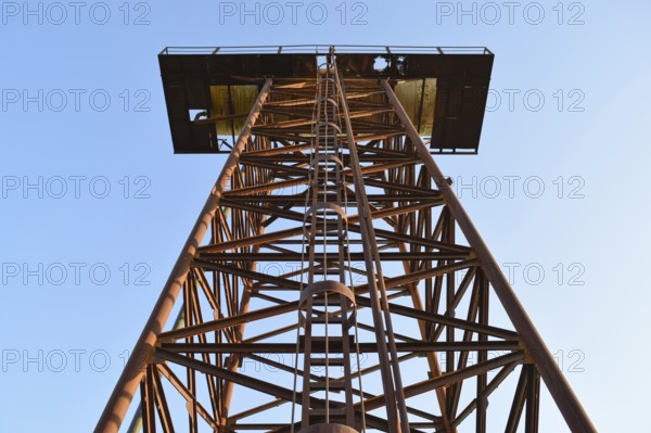 The old rusty water tower tilted. Atyrau, Kazakhstan