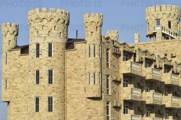 The hotel building, covered with decorative stone. Golubitskaya, Russia