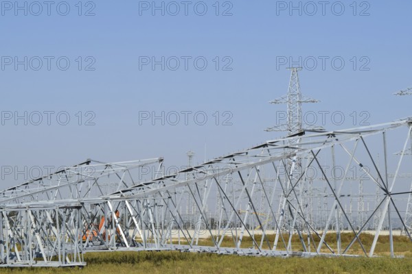 Power line support, insulators and wires. Taman, Krasnodar Krai, Russia