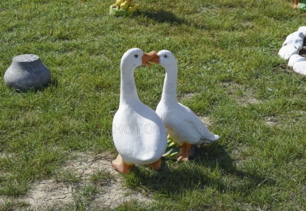 Toy geese on the lawn. Taman, Krasnodar Krai, Russia
