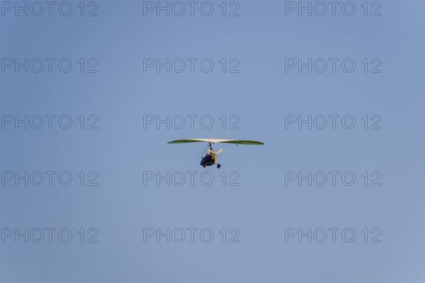 Trike, flying in the sky with two people. Atyrau, Kazakhstan