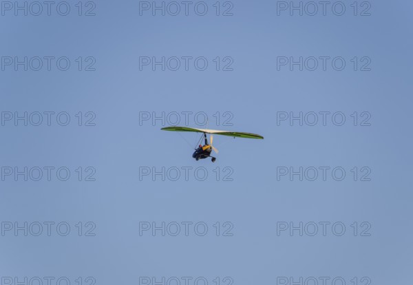 Trike, flying in the sky with two people. Atyrau, Kazakhstan