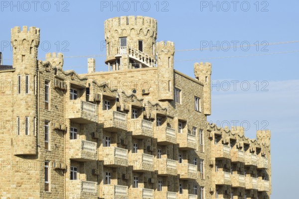 The hotel building, covered with decorative stone. Golubitskaya, Russia
