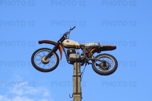 Motorcycle on the pedestal. Atyrau, Kazakhstan