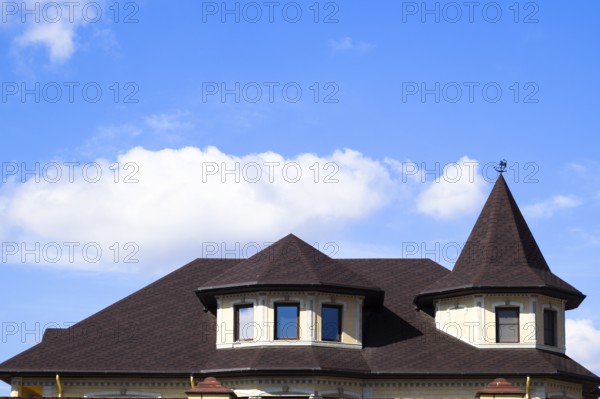 Decorative metal tile on a roof. Atyrau, Kazakhstan
