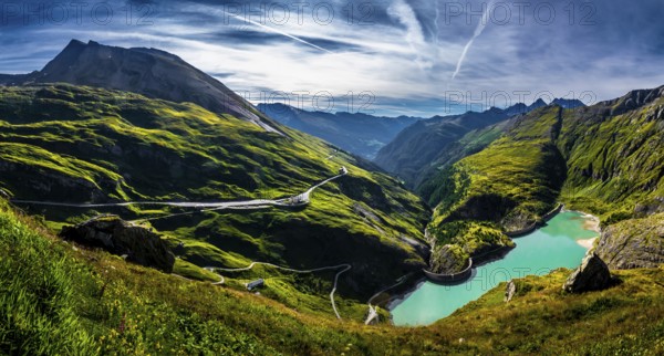 Pasterze Glacier Lake With Hydropower Dam In National Park Hohe Tauern With Großglockner High Alpine Road In Austria