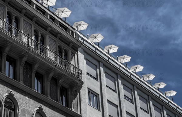 Roof Terrace With Sun Parasols On Historic And Modern Buildings In The Inner City Of Vienna In Austria