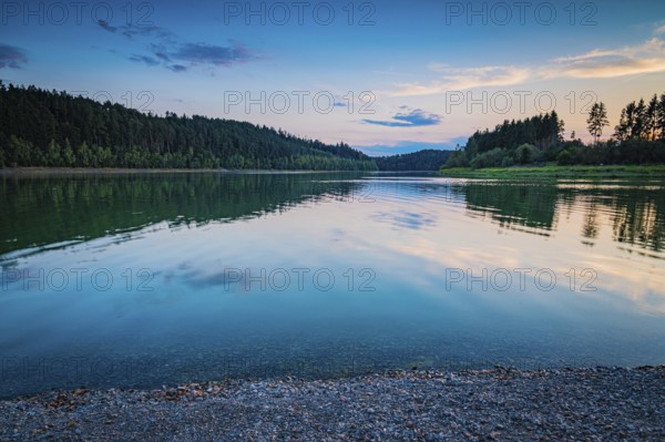 Reflecting water in the reservoir against an evening forest backdrop and a peaceful atmosphere, Zeulenrodaer Meer reservoir, Zeulenroda-Triebes, Thuringia, Germany