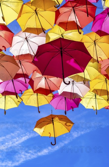 Colorful Umbrellas Hanging As Street Decoration And Sun Protection In The City Of Bordeaux, France