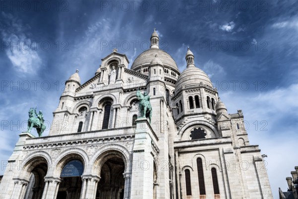 Basilica Sacre Coeur At The Montmartre Hill In Paris, France