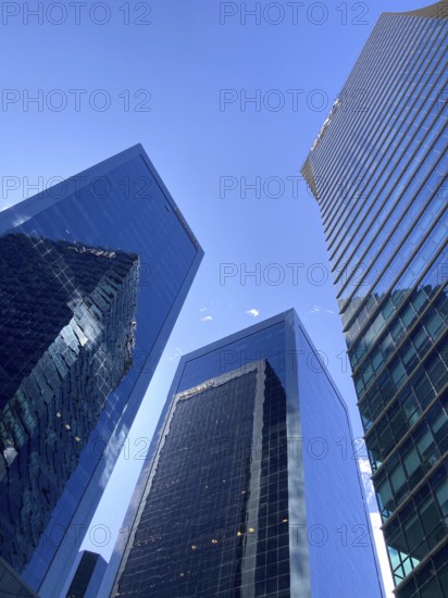 Impressive architecture and reflections in the glass facades of the skyline in the centre of Buenos Aires with the buildings Torre Alem Plaza (left), torre Catalinas Plaza (centre) and Torre BBVA (right), Retiro, Buenos Aires, Argentina