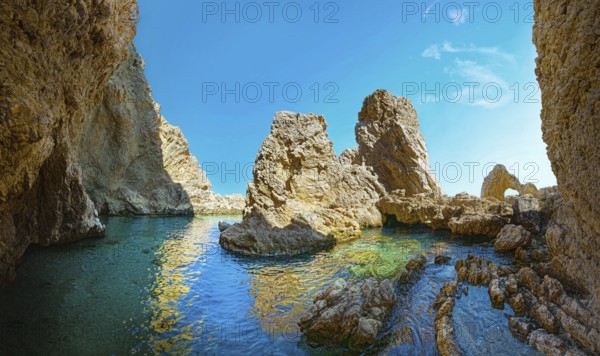 Cave of Archangelos with crystal clear water and sunny sky, Cave of Archangelos, Grande Blue Beach, Stegna, Archangelos, Rhodes Island, Greece