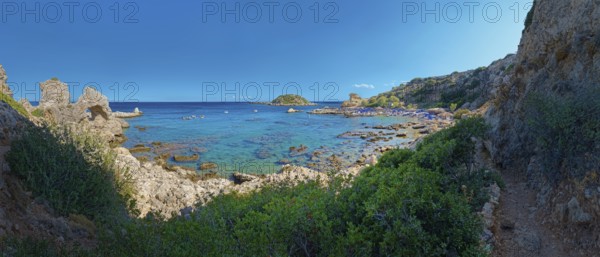 Grande Blue coastal landscape with rocks and clear blue sea in the background, sunny and quiet, Grande Blue Beach, Stegna, Archangelos, Rhodes Island, Greece