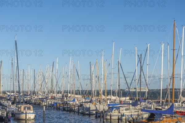 Strande marina near Kiel, Rendsburg-Eckernförde district, AIDA, ship masts, dolphins, Baltic Sea, sailing, leisure activities, water sports, maritime atmosphere, summer, blue sky, sunshine, Bay of Kiel, Schleswig-Holstein, Germany